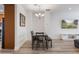 Dining area with chandelier and hardwood floors at 2409 Kilgore St, Orlando, FL 32803