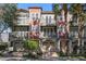 Three-story townhouses with attached garages and balconies at 2409 Kilgore St, Orlando, FL 32803