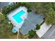 L-shaped pool and clubhouse aerial view at 2580 Grassy Point Dr # 102, Lake Mary, FL 32746