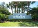 Luxury condo community entrance with landscaping at 2580 Grassy Point Dr # 102, Lake Mary, FL 32746