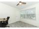 Home office with desk, chair, and built-in shelving at 2580 Grassy Point Dr # 102, Lake Mary, FL 32746