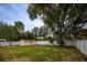 Large backyard with shed, trees, and a picnic table at 2585 Northland Rd, Mount Dora, FL 32757