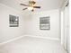 Spacious bedroom with tile flooring and neutral wall colors at 2585 Northland Rd, Mount Dora, FL 32757