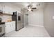 Kitchen with stainless steel appliances and white cabinets at 2585 Northland Rd, Mount Dora, FL 32757