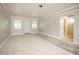 Bright living room with tile floors and neutral color palette at 2585 Northland Rd, Mount Dora, FL 32757