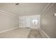 Bright living room with tile floors and neutral color palette at 2585 Northland Rd, Mount Dora, FL 32757