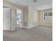 Spacious bonus room with neutral carpeting at 2655 Trafalgar Blvd, Kissimmee, FL 34758