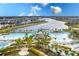 Aerial view of resort with pool and lake at 2904 On The Rocks Pt, Kissimmee, FL 34747