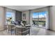 Modern living room with sliding glass doors to the patio at 2909 Hudson Hammock Way, Saint Cloud, FL 34773