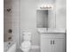 Modern bathroom with white vanity and shower at 30 Sheoah Blvd # 18, Winter Springs, FL 32708