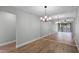 Dining room with hardwood floors and a large mirror at 30 Sheoah Blvd # 18, Winter Springs, FL 32708