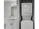 Stackable washer and dryer in laundry closet at 30 Sheoah Blvd # 18, Winter Springs, FL 32708