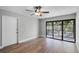 Bright living room with hardwood floors and sliding glass doors at 30 Sheoah Blvd # 18, Winter Springs, FL 32708