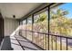 Screened balcony overlooking trees and parking at 30 Sheoah Blvd # 18, Winter Springs, FL 32708