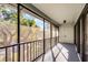 Screened balcony with view of trees at 30 Sheoah Blvd # 18, Winter Springs, FL 32708