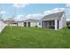 Large grassy backyard with screened patios at 3092 Prelude Ln, Kissimmee, FL 34746