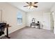 Bright bedroom with window and desk setup at 3092 Prelude Ln, Kissimmee, FL 34746