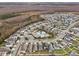 Aerial view of community, highlighting the neighborhood and green spaces at 3092 Prelude Ln, Kissimmee, FL 34746