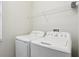 Laundry room with side-by-side washer and dryer at 3092 Prelude Ln, Kissimmee, FL 34746