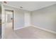 Neutral-toned bedroom with access to another bedroom and closet at 3170 Santa Cruz Dr, Kissimmee, FL 34746