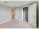 Well-lit bedroom includes a walk-in closet and neutral carpeting at 3170 Santa Cruz Dr, Kissimmee, FL 34746