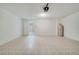 Attached garage with ample space and tiled floor at 3170 Santa Cruz Dr, Kissimmee, FL 34746