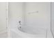 Clean bathroom with a bathtub and tile surround at 3427 Kayla Cir, Oviedo, FL 32765