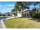 Two-story house with white garage doors and green lawn at 3427 Kayla Cir, Oviedo, FL 32765