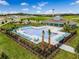 Aerial view of community pool, playground, and clubhouse at 3576 Fort Mellon Ln, Sanford, FL 32773