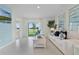 Living room features a blue accent wall and sliding glass doors at 3576 Fort Mellon Ln, Sanford, FL 32773