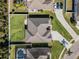 Aerial view of property featuring large backyard, swimming pool, and neutral roof at 381 Skyview Pl, Chuluota, FL 32766