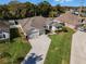 Aerial view showing house, driveway, and surrounding landscape at 381 Skyview Pl, Chuluota, FL 32766