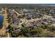 Wide aerial view of neighborhood with lake at 381 Skyview Pl, Chuluota, FL 32766