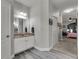 Hallway bathroom featuring single vanity at 381 Skyview Pl, Chuluota, FL 32766