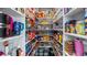 Walk-in pantry featuring ample shelving fully stocked with various food items and household supplies at 3943 W Campbell Rd, Lakeland, FL 33810