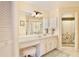 Bathroom with vanity, large mirror and shower at 3992 Radley Ct, Longwood, FL 32779