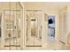 Shared bathroom with mirrored closet doors and shower at 3992 Radley Ct, Longwood, FL 32779