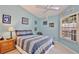 Bright bedroom with double bed and ample closet space at 3992 Radley Ct, Longwood, FL 32779