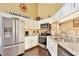 Well-equipped kitchen featuring stainless steel appliances and granite countertops at 3992 Radley Ct, Longwood, FL 32779