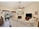 Cozy living room featuring a fireplace and sliding glass doors at 3992 Radley Ct, Longwood, FL 32779