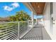 Private balcony with wood ceiling and metal railing at 400 W Hazel St, Orlando, FL 32804