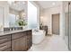 Elegant bathroom with soaking tub, walk-in shower, and modern finishes at 400 W Hazel St, Orlando, FL 32804