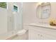 Clean bathroom with white vanity, quartz countertop and walk-in shower at 400 W Hazel St, Orlando, FL 32804