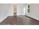 Bedroom with hardwood floors and access to hallway at 400 W Hazel St, Orlando, FL 32804