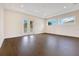 Spacious bedroom with hardwood floors and balcony access at 400 W Hazel St, Orlando, FL 32804