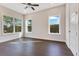 Spacious bedroom with hardwood floors and multiple windows at 400 W Hazel St, Orlando, FL 32804