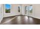 Hardwood floor bedroom with access to balcony at 400 W Hazel St, Orlando, FL 32804