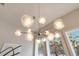 Modern chandelier with glass globes, perfect for a dining room at 400 W Hazel St, Orlando, FL 32804