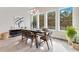 Bright dining area with a farmhouse style table and hardwood floors at 400 W Hazel St, Orlando, FL 32804