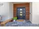 Modern front door with wood paneling and a stone walkway at 400 W Hazel St, Orlando, FL 32804